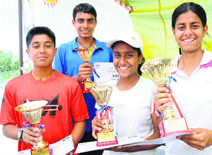 Winners pose with their trophies in Kharar on Monday.