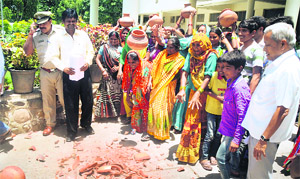 Residents of Indira and Rajiv colonies hold a protest at the Mini-Secretariat in Panchkula on Monday.