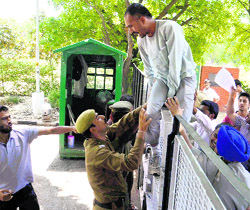 Students try to enter the VCs office during a protest at Panjab University on Monday.