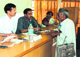 District Magistrate D Senthyl Pendiyan listens to the complaint of a senior citizen at a janta darbar in Haridwar on Monday