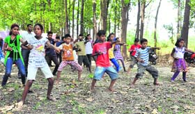 In action: Youngsters take part in the martial arts camp in Dehradun on Monday