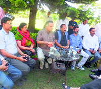 Transport and Technical Education Minister GS Bali addresses mediapersons at his residence in Kangra on Monday.