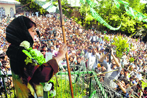 PDP president Mehbooba Mufti addresses a public rally in Kulgam on Monday.