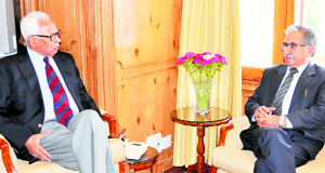 Minister for Agriculture Production Ghulam Hassan Mir calls on Governor NN Vohra in Srinagar on Monday.