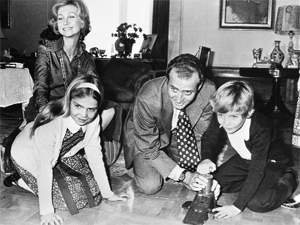 A file photo taken in February 1976 shows King Juan Carlos of Spain and his wife Queen Sophia of Greece, playing with their children Crown Prince Felipe, 8, and daughter Elena, 12, in Zarzuela Palace in Madrid.