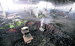 A view of the Vallah vegetable market after the fire was extinguished in Amritsar on Tuesday