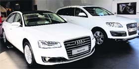 An Audi A8 and an Audi Q7 on display at a showroom in the Industrial Area, Chandigarh