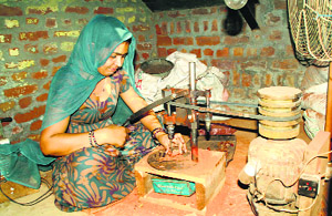 A woman at work in Hisars Mangali village