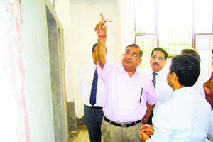 Justice SK Mittal points at deficiency in construction of the ADR Centre in Jind on Tuesday.