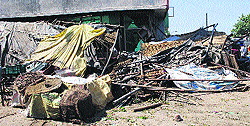 The demolished kiosks at the wholesale vegetable market at Vallah in Amritsar on Wednesday