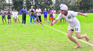 Hockey players in action during hockey trials at the Sports Complex, Sector 46, Chandigarh. 