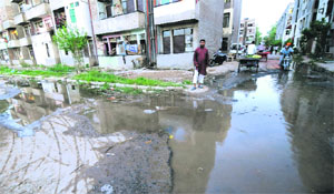 A water-logged street due to leakage in a pipeline at EWS Colony in Sector 38 West, Chandigarh. 