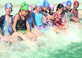 Fun time: Children participate in a summer summing camp