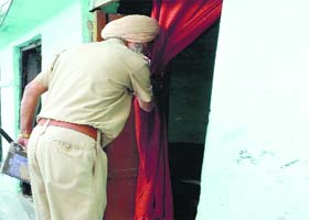 Fighting drug menace: The city police conduct a raid at the Qazi Mandi to check drugs in Jalandhar on Wednesday