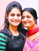 Tavleen Kour Risam with her mother.