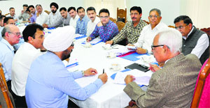 Governor NN Vohra interacts with camp directors in Srinagar on Wednesday.
