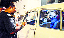 Parvez Fazal Khan (L) on the sets