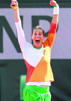 Germanys Andrea Petkovic celebrates her victory over Italys Sara Errani at the end of the French Open quarterfinal match in Paris on Wednesday.