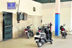 Two-wheelers of railway employess parked behind the ticket reservation counter at the city railway station in Bathinda