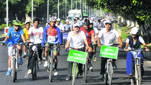 Youngsters take part in a cycle rally organised to mark World Enviornment Day at Sukhna Lake on Thursday.