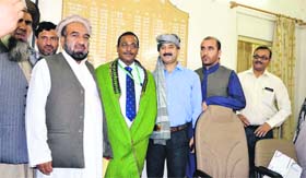 Dehradun District Magistrate BVRC Purushottam, with members of an Afghanistan delegation in Dehradun on Thursday.