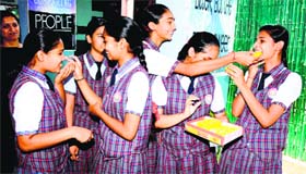 Class 10 students share sweets in Bhiwani.