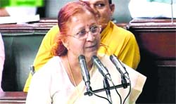BJP leader Sumitra Mahajan takes oath as a Lok Sabha member in New Delhi on Thursday.