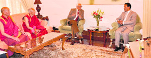 Members of the organising committee of the 33rd Ladakh Kalchakra-2014 with Governor NN Vohra at Raj Bhawan in Srinagar on Thursday.