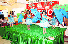 Students of Hattrick School perform during World Environment Day in Srinagar on Thursday.