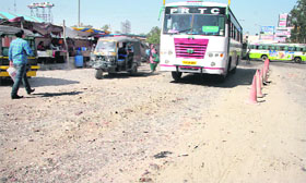 a worn out portion of a road outside the bus stand in Jalandhar.