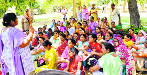 An anganwadi worker addresses a meeting in Ludhiana. 