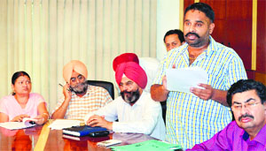 An auction of parking lots under way in Ludhiana.