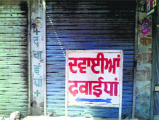 A chemist shop remains closed in Ludhiana on Thursday afternoon.