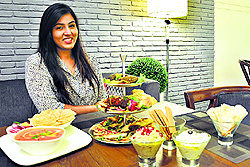 Gayatri Sood, Owner, Monica's Kitchen and Kaffe, which serves A three-tier food platter