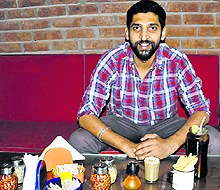 Ayush Singla, owner, Mocha, Elante, serves the Cutting Chai