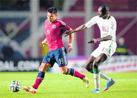 Colombias forward Teofilo Gutierrez (left) during a friendly against Senegal in Buenos Aires