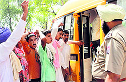 Farmers shout slogans outside the IGP office seeking release of their leaders and other workers in Bathinda on Friday