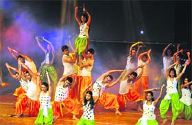 Students of Shiamak Davar Dance Institute present an item during the concluding function of a workshop, organised by the Durga Das Foundation at Tagore Theatre in Chandigarh on Friday.