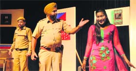 Artistes enact a scene from a play, "Tamasha Motyan Da", at the Punjab Kala Bhawan, Sector 16, Chandigarh, on Friday.