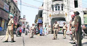Policemen outside a gurdwara in Jalandhar on Friday