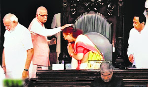 Newly-elected Speaker Sumitra Mahajan seeks blessings of senior BJP leader LK Advani in the Lok Sabha in New Delhi on Friday.