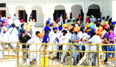 Members of the SGPC task force and activists of radical Sikh groups clash at the Golden Temple on Friday.
