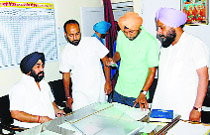 Makhan Singh Lalka (seated), SAD halqa in charge, during a raid at a health centre in Nabha on Friday.