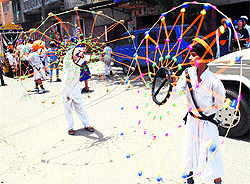 Students display their Gatka skills during Fateh Divas celebrations in Amritsar on Saturday