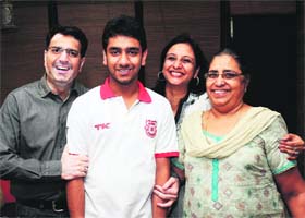 Mohak Gupta in a jubilant mood with his parents after the declaration of the AIPMT result in Bathinda on Saturday
