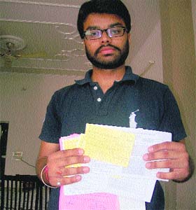 Ajitesh Kumar Garg shows the complaints written by his late mother to the officials of the Bathinda Development Authority (BDA) and Water Supply & Sanitation Department