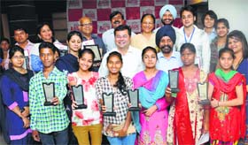 The staff of the Aryans Group of Colleges with the representatives of eight NGOs on the campus in Chandigarh on Saturday