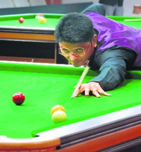 Aiming right: Former Asian billiards champion Rupesh Shah in action during the 15th Asian Billiards and Snooker (U-21) Championship held at UT Guest House in Chandigarh on Saturday