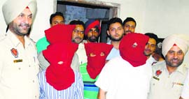 The smugglers in police custody in Jalandhar on Saturday.