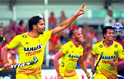 Akashdeep Singh celebrates after scoring a goal against Malaysia in The Hague on Saturday